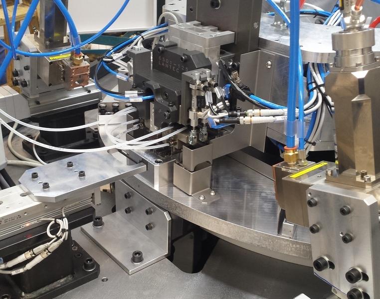 Laser welding station for automotive component